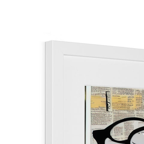 An art print sits on the black and white photo frame.