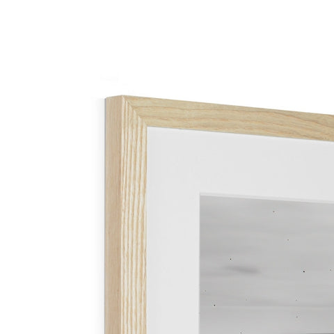 A picture frame on top of a wood frame