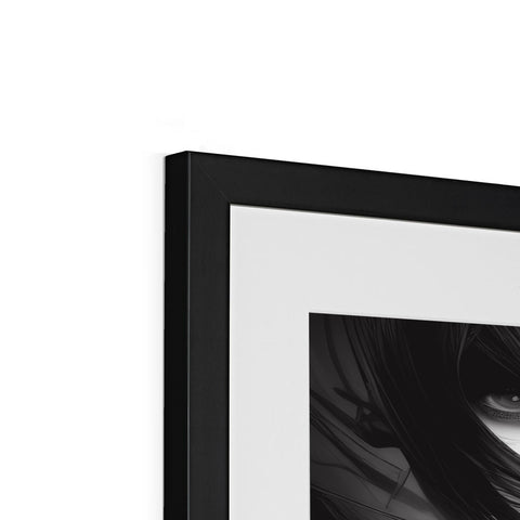 A picture of a black and white photo sitting in a frame next to some empty frames