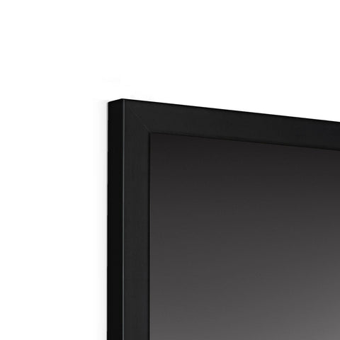 A TV with big black flat screen, white TV on top of a black background.