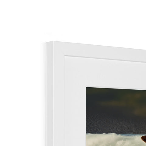 a picture frame with a picture on top of a white display.