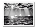 Art print of three sunbeams on a sunny beach in the distance