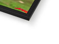 A softcover photograph on a hard surface that a baseball player is playing on.