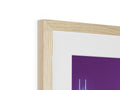 A small picture frame made of wood that has a tall view of a city skyline on