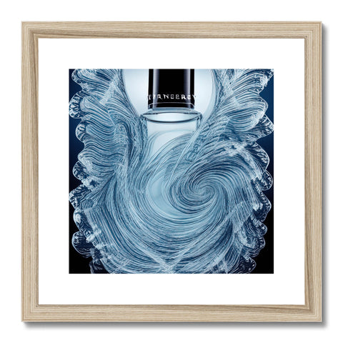 An angel in blue feather duster sits on top of a white paper art print.