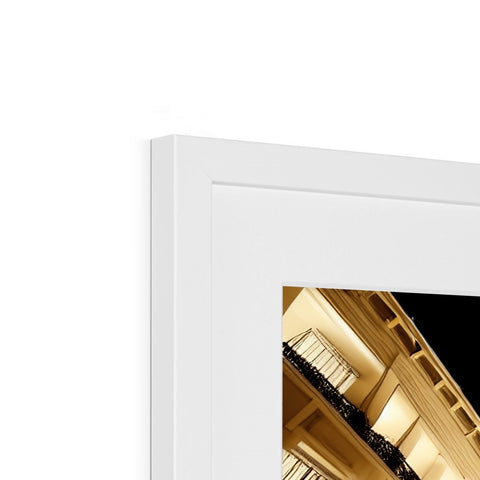 An image of a picture frame in two different colors with multiple white pictures on it.