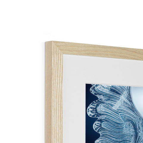 A frame that is in blue and black wood with a picture in it's frame.