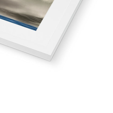A white photo of a painted white picture frame on a wall