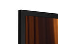 A large screen television has a couple of close up panes of gray wood on it