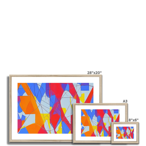 A set of a couple of colorful, silver framed frames sitting next to each other.