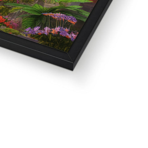 A picture frame with two items placed on a black frame.