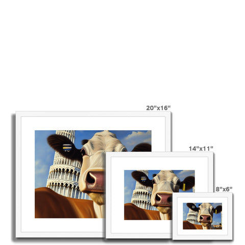 Two cows on top of a table holding a picture close ups of a greeting card,
