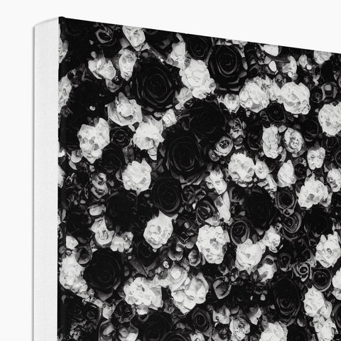 a notebook with a black and white image of flowers on it printed on a white page