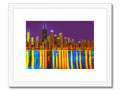 Some cityscape views of the city skyline with the skyline behind an art print on the