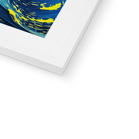 A framed picture of an imac art print is displayed in a wall.