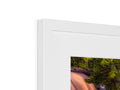 An image of a picture frame that is in a frame on a wall attached to a