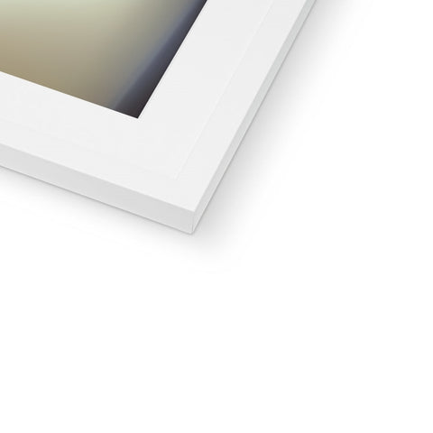 A picture frame that has a picture of an  imac sitting in a white window