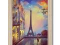 A picture of Paris in the sunset on a wood frame with a French skyline.