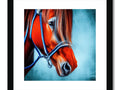 An art print hanging on a frame of the horse with a dress and bridle on