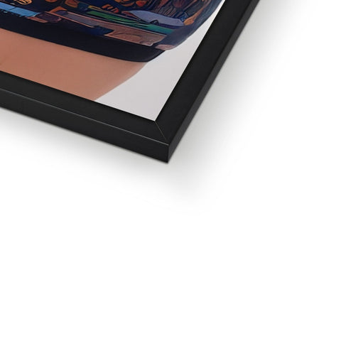 An art print displayed in a picture frame on a table