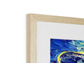 A picture of a blue picture hanging in a white wooden frame.