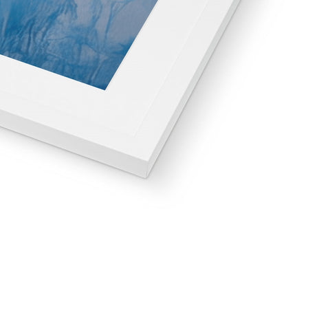 A photo of a white and blue background on a poster in a frame