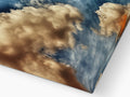 a painting with clouds above a table using a 3D image.