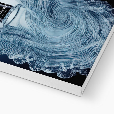 An image of an imac next to water on a black cloth page on books.