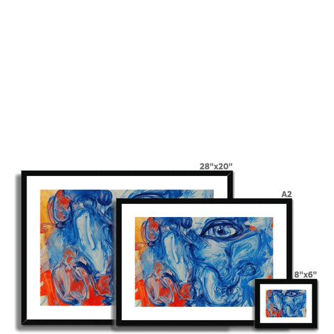 Three art prints are framed on a wall in different colours and types