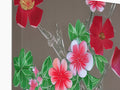 Multiple pieces of red floral artwork for decoration and to be used with glasses.