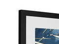 An art print is also on top of a metal frame with a picture.