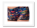 An art print printed photo of a pair of boys in black swim shorts is on the