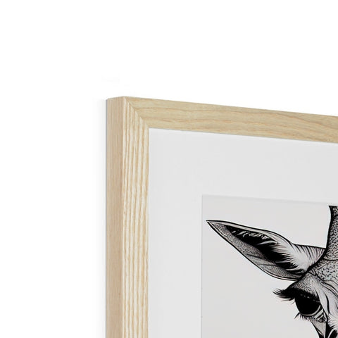 A wooden framed art print with a cuckoo on it.