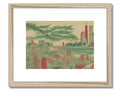 An art print frame that shows a city skyline and trees.