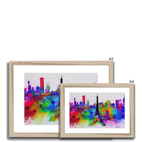 A picture of three cityscapes and an art print of a city skyline set on