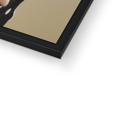 a mirror holding a silver slide board in a black frame with a black paper print on