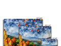 A large view of snow covered mountains in different seasons on a large canvas painting.