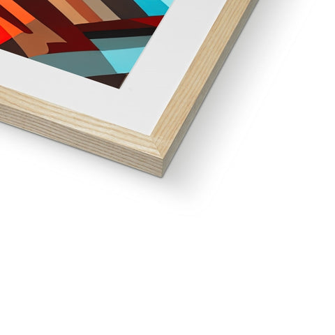 Some art prints stacked atop of a wooden frame on a wall that