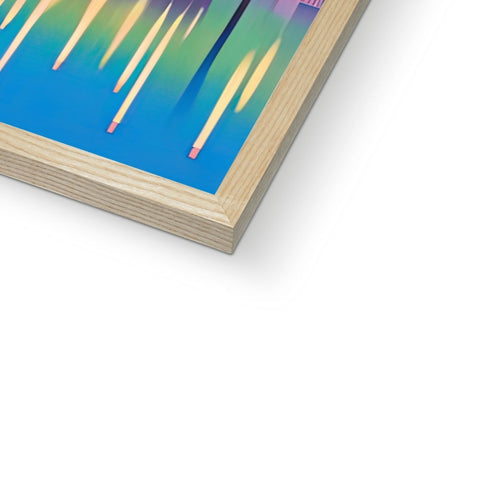 An art print set with a few plastic sticks in front of a book.