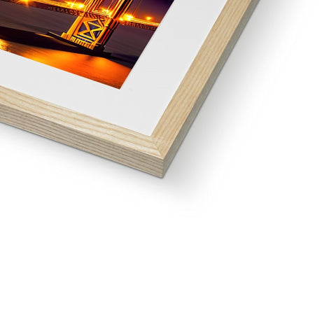 A photo of a picture frame in wood frame.