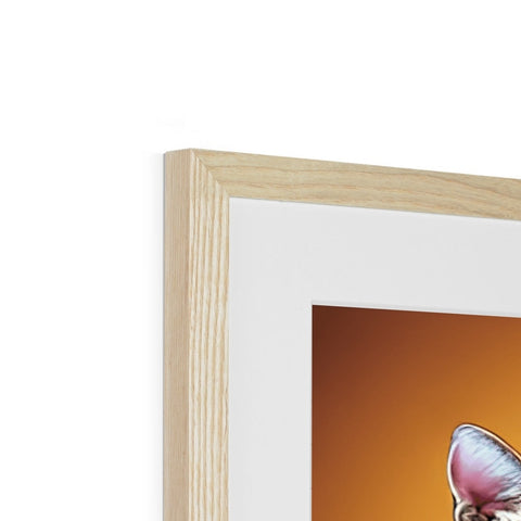 A photo has artwork in a wooden frame with a flower and a wooden photo frame
