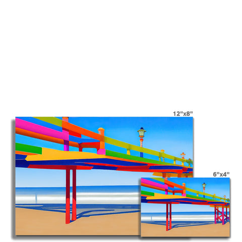 A large board in surfboard ramps are standing near shoreside with some painted and painted