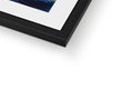 A picture frame frame in a tall frame is holding an art print of an abstract photograph