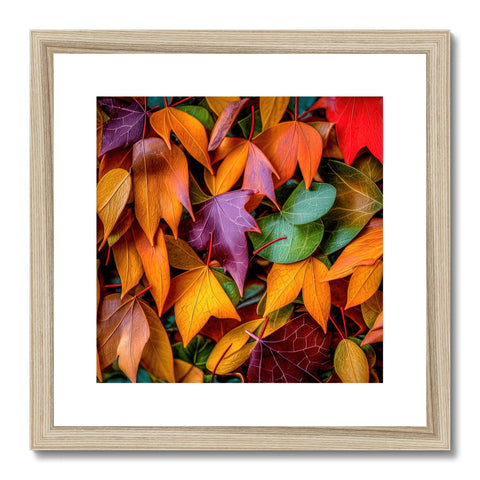 a wood framed art print with autumn leaves hanging from a building