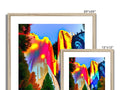 A wooden frame with three very colorful images holding a frame of two of the images.