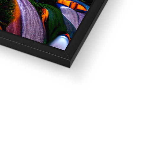 An image in a frame on top of a photo frame with a piece of colored glass