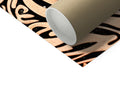 a paper roll on a roll of gold foil set in an opening