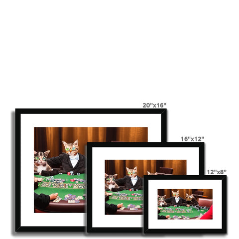 A group of five cats sitting on and facing a couch with multiple picture frames.