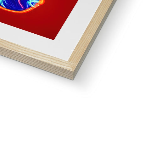 A white picture that is on a picture frame with a blue and red color color.