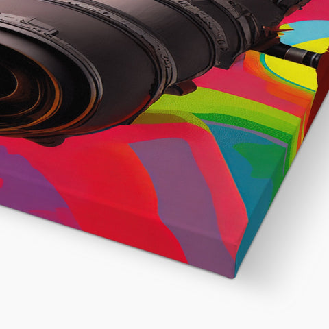 A photograph of a colorful print umbrella next to a small white camera lense with a